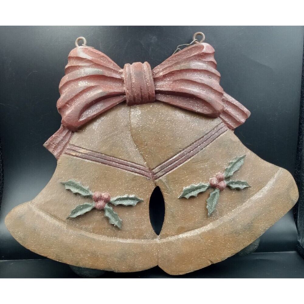 Copper colored wood glitter bells w red painted bows, holly & berries 13"x11"